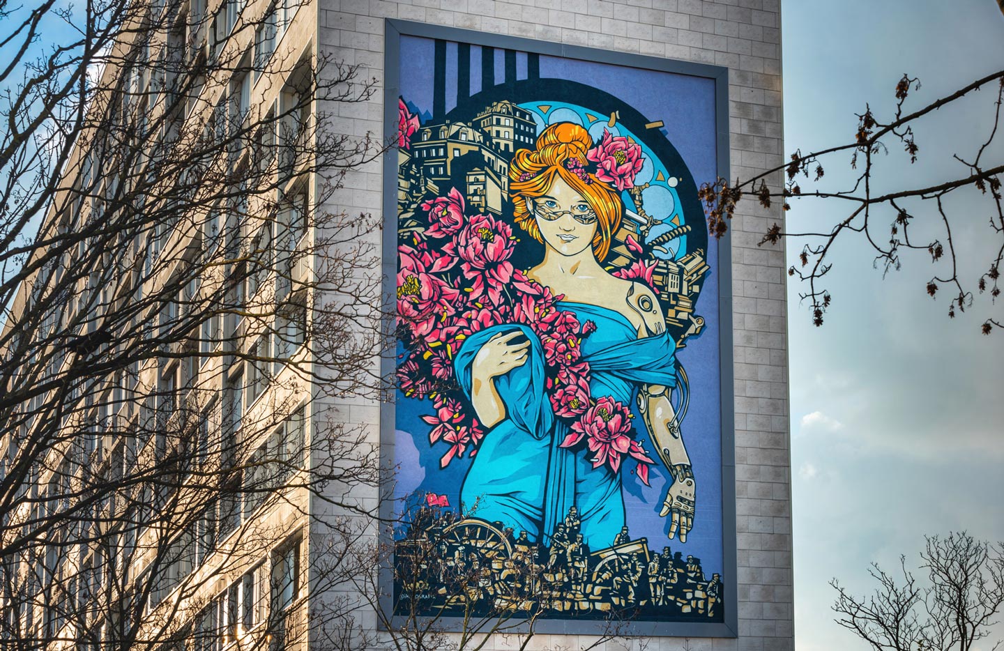 a huge street art mural painted by alex kanos, a woman tribute to mucha with cyberpunk elements