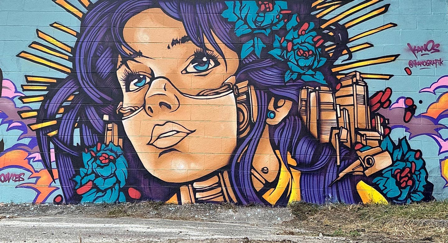 a street art piece made by alex kanos in chattanooga