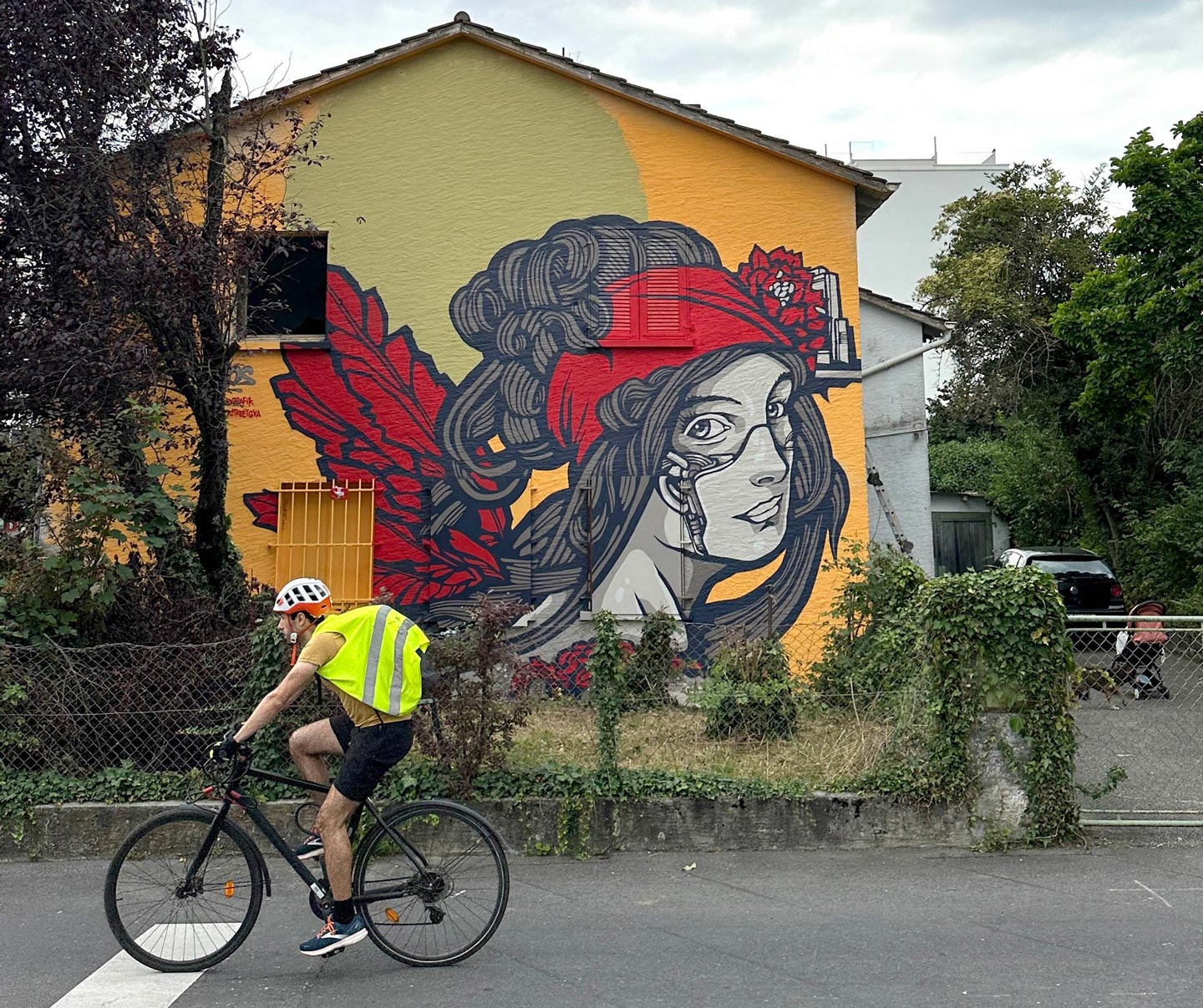 a street art mural paint by alex kanos in geneva switzerland