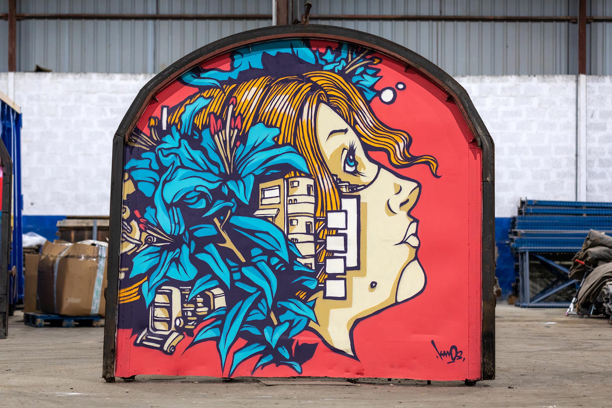 a graffiti made by alex kanos on a train piece of steel during deraille street art event