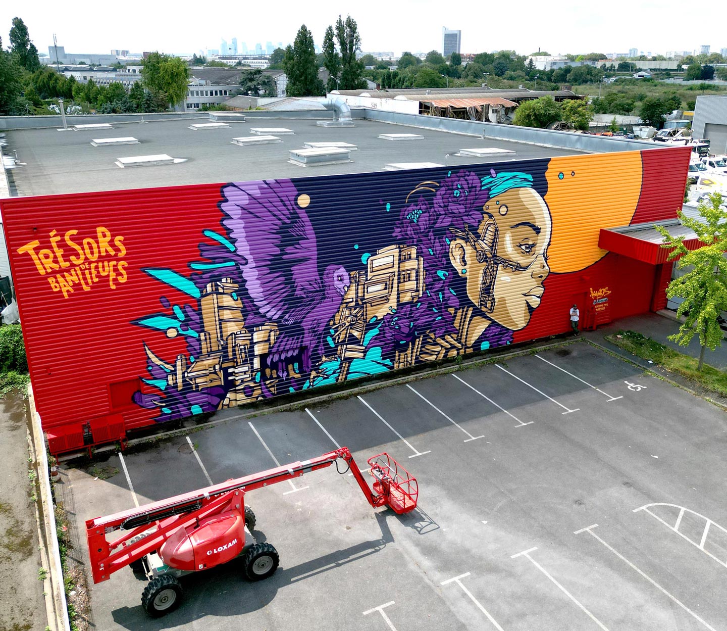 alex kanos is painting a street art mural called minerva in genevilliers for tresors de banlieues exhibition